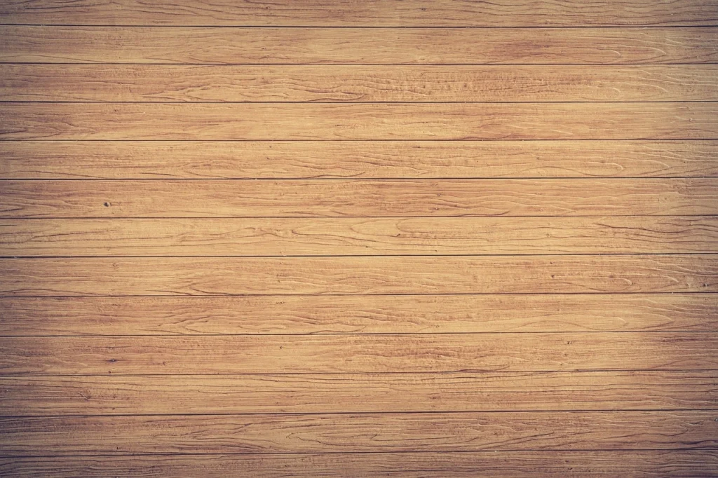Wooden texture background featuring a series of rustic wooden planks arranged in a natural pattern.